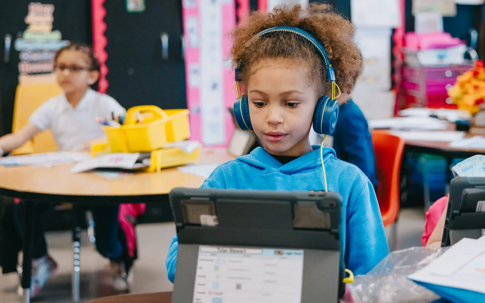 Greeley-girl in blue with headphones